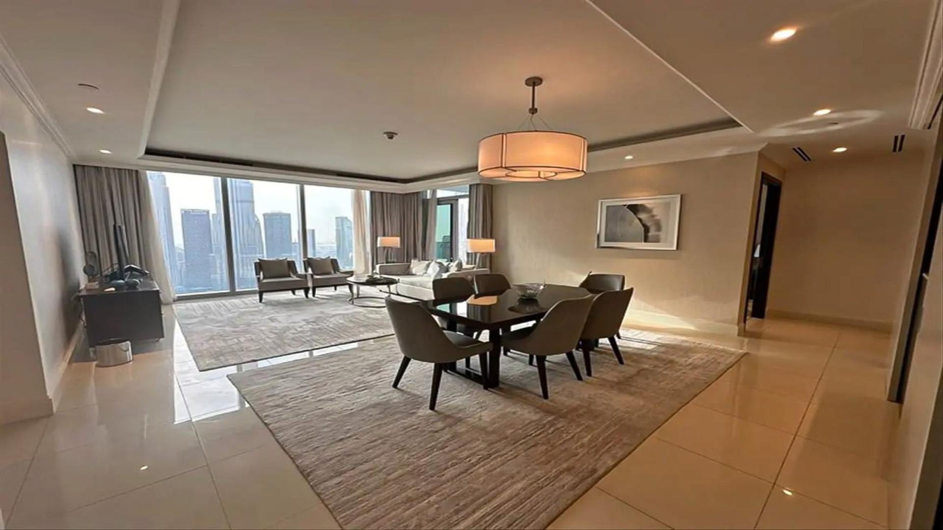 Furnished dining and living area in serviced Downtown Dubai apartment