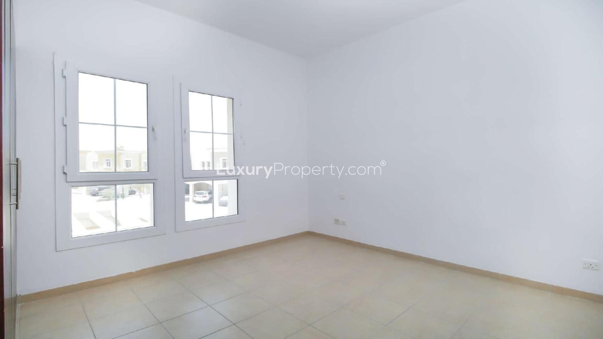 Empty room with large windows in 3-bedroom villa, Al Reem 1, Arabian Ranches