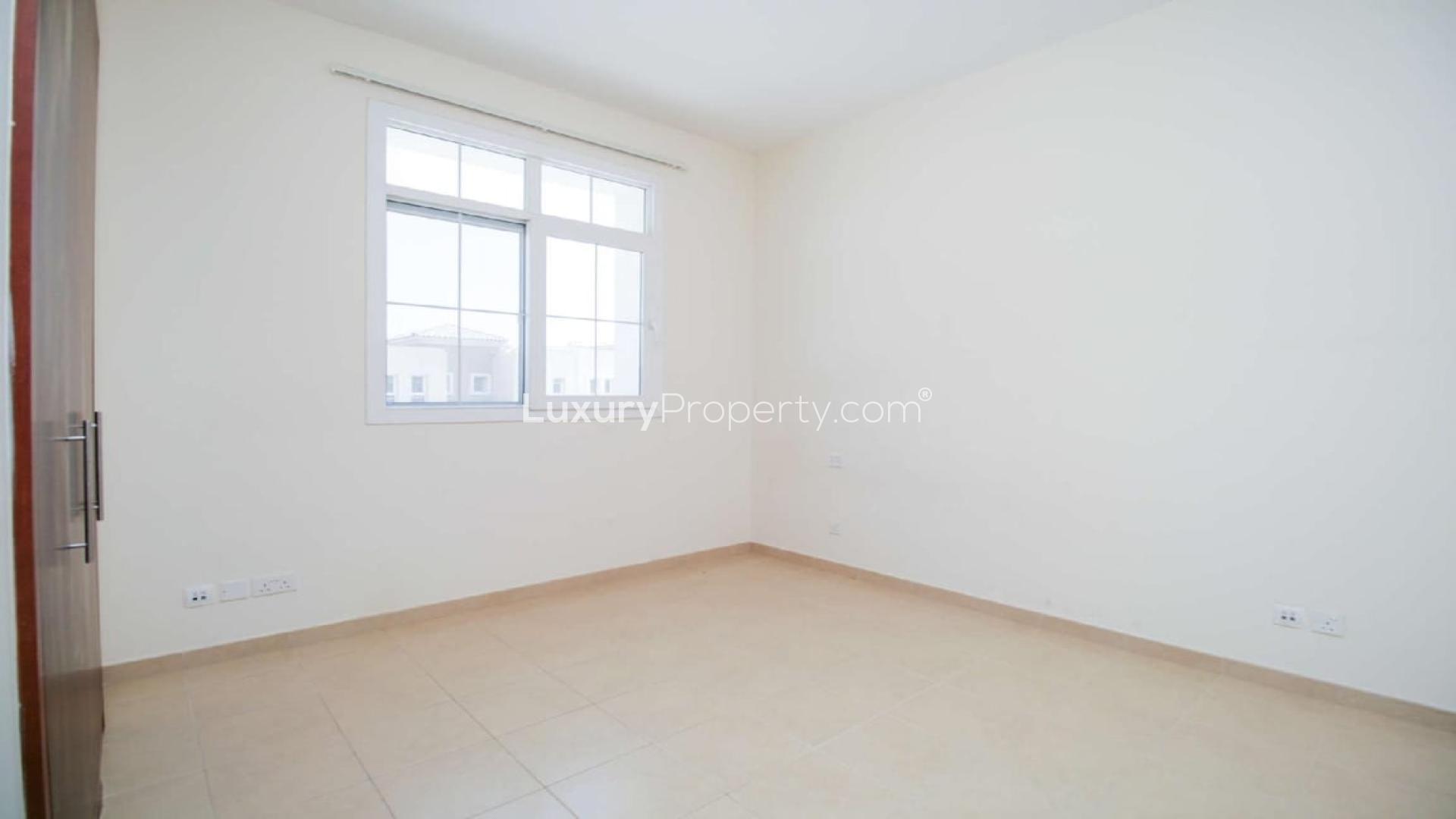 Upgraded 3-bedroom villa exterior in Alma, Arabian Ranches, with private garden, for rent