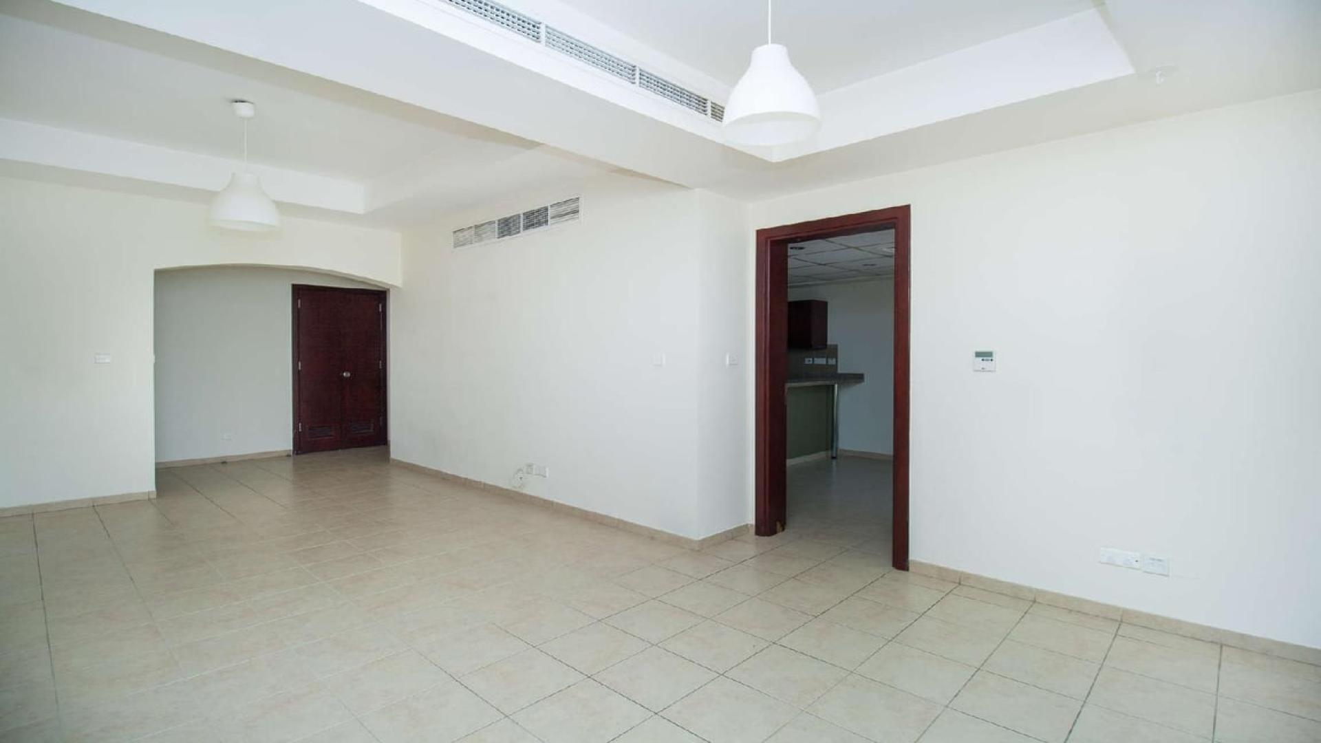 Bright living room with garden view in Al Reem 1 villa, Arabian Ranches