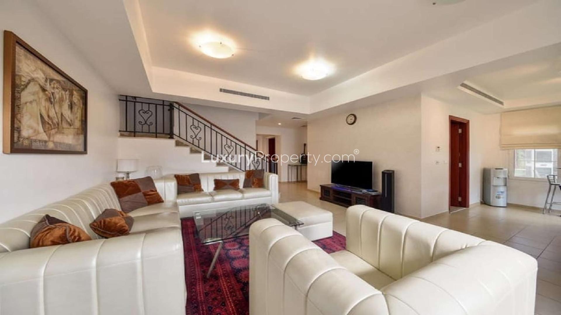 Elegant living room in upgraded Palmera 1 villa, Arabian Ranches, with modern decor