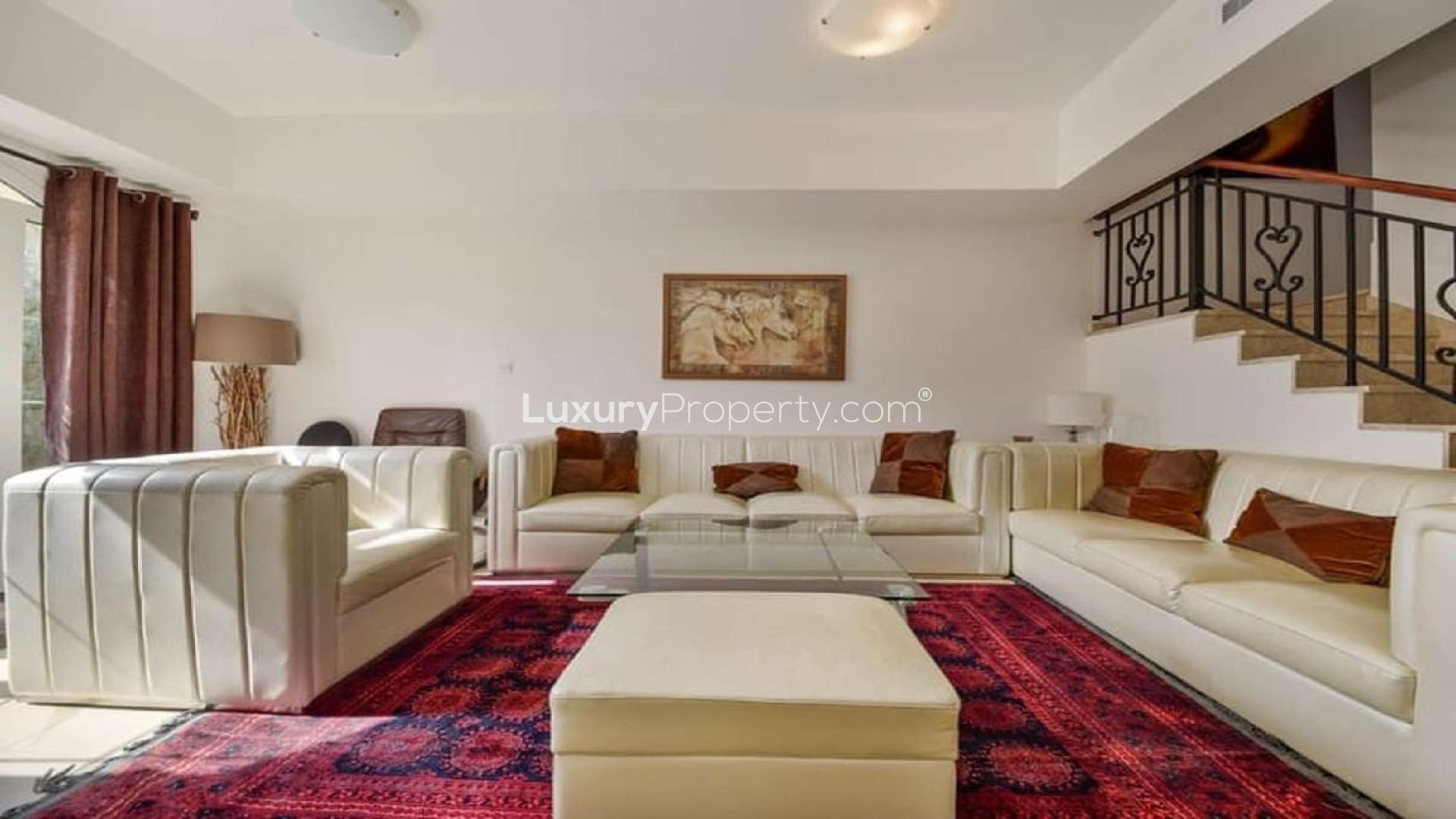 Immaculate living room in upgraded Palmera 1 villa, Arabian Ranches, featuring elegant decor