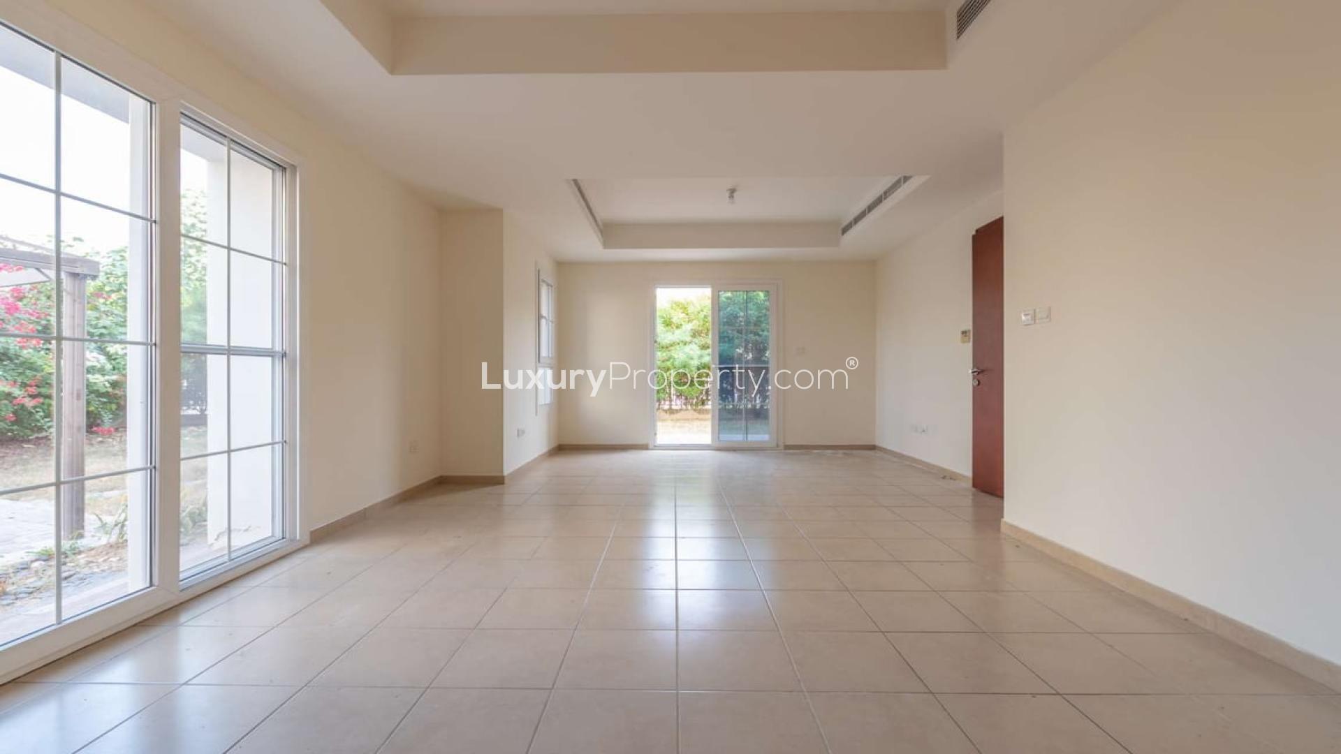 Balcony view from 3-bedroom villa in Ghadeer, The Lakes, Dubai, showing lush greenery