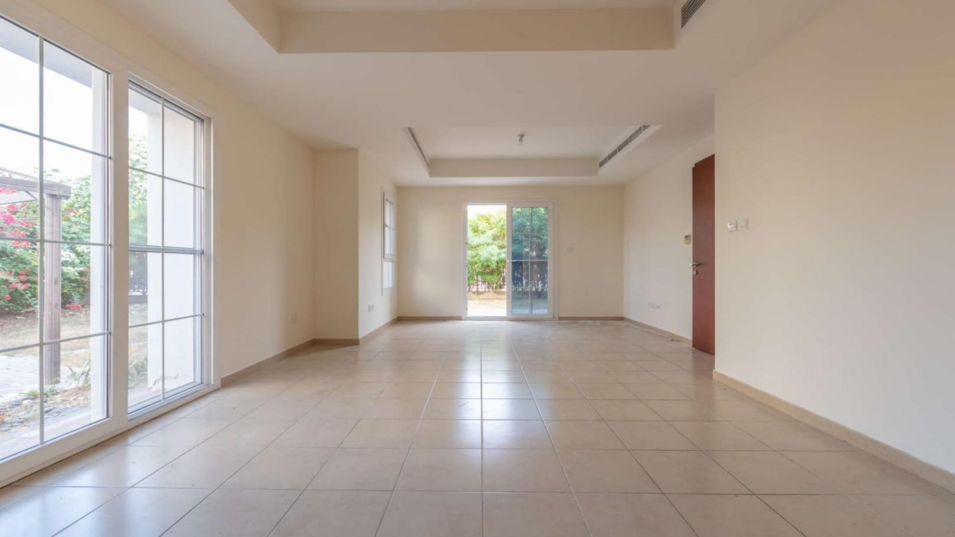 Balcony view from 3-bedroom villa in Ghadeer, The Lakes, Dubai, showing lush greenery
