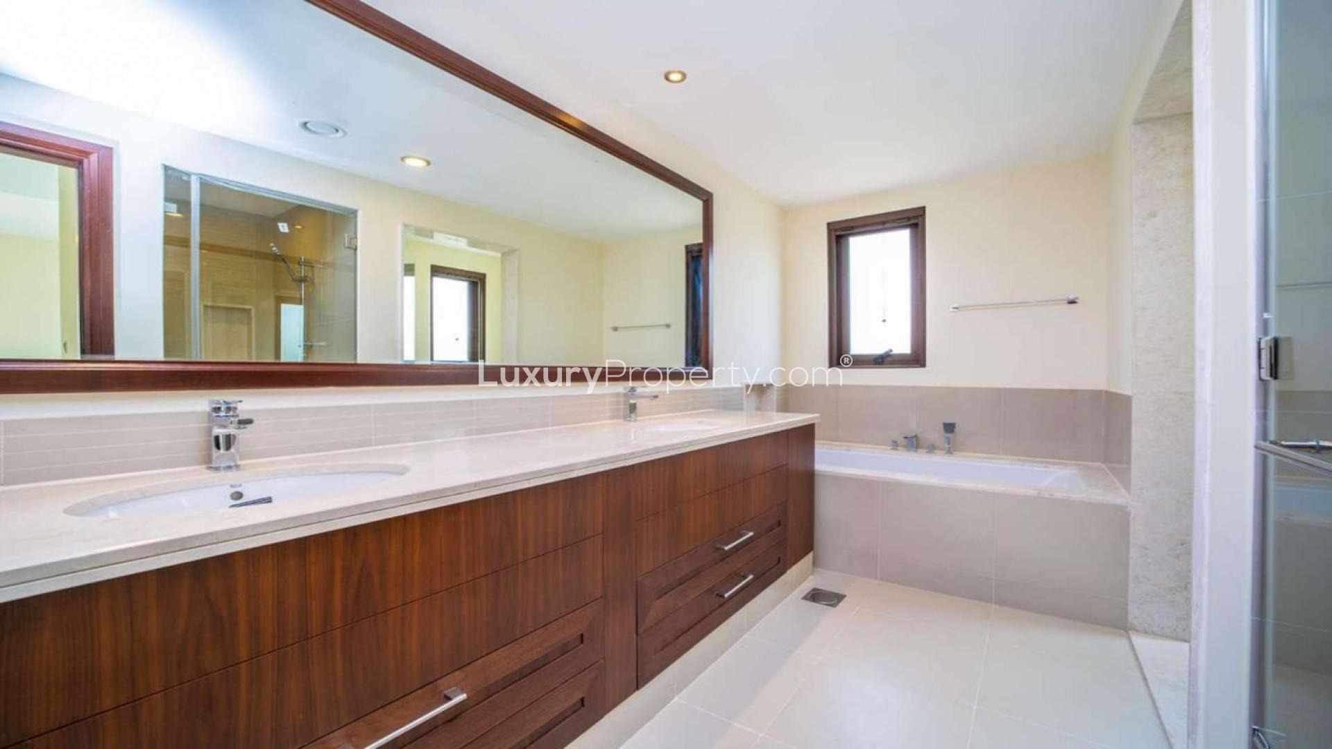 Spacious living room in 3-bedroom villa, Lila, Arabian Ranches 2, with large windows