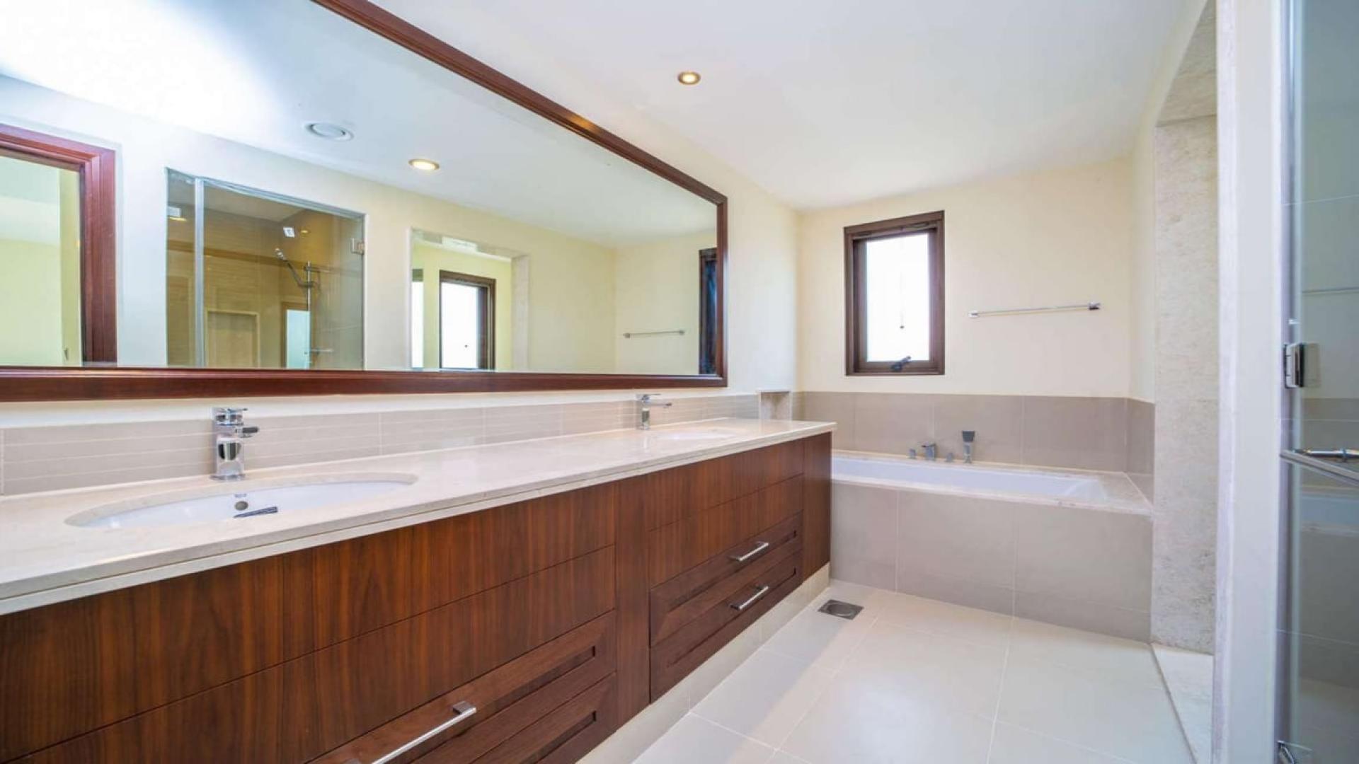 Spacious living room in 3-bedroom villa, Lila, Arabian Ranches 2, with large windows