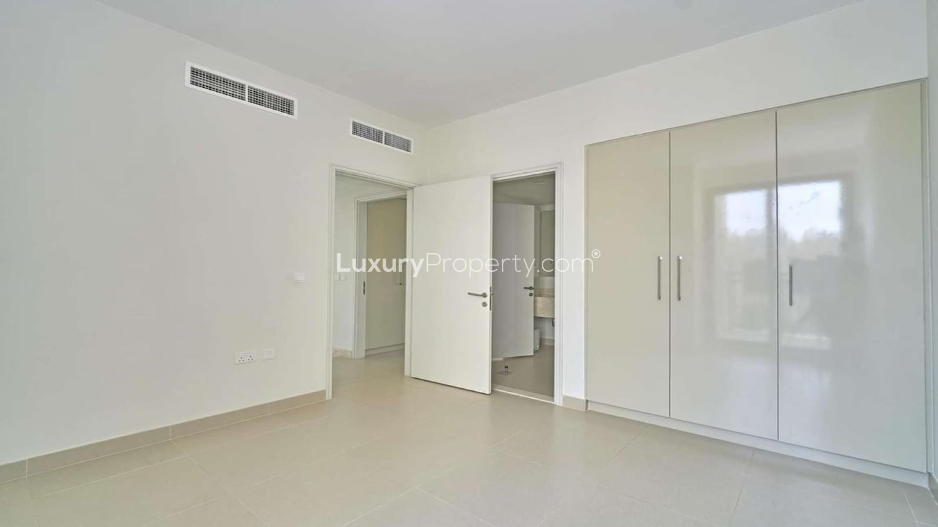 Empty bedroom with built-in wardrobe in Maple 1 townhouse, Dubai Hills Estate