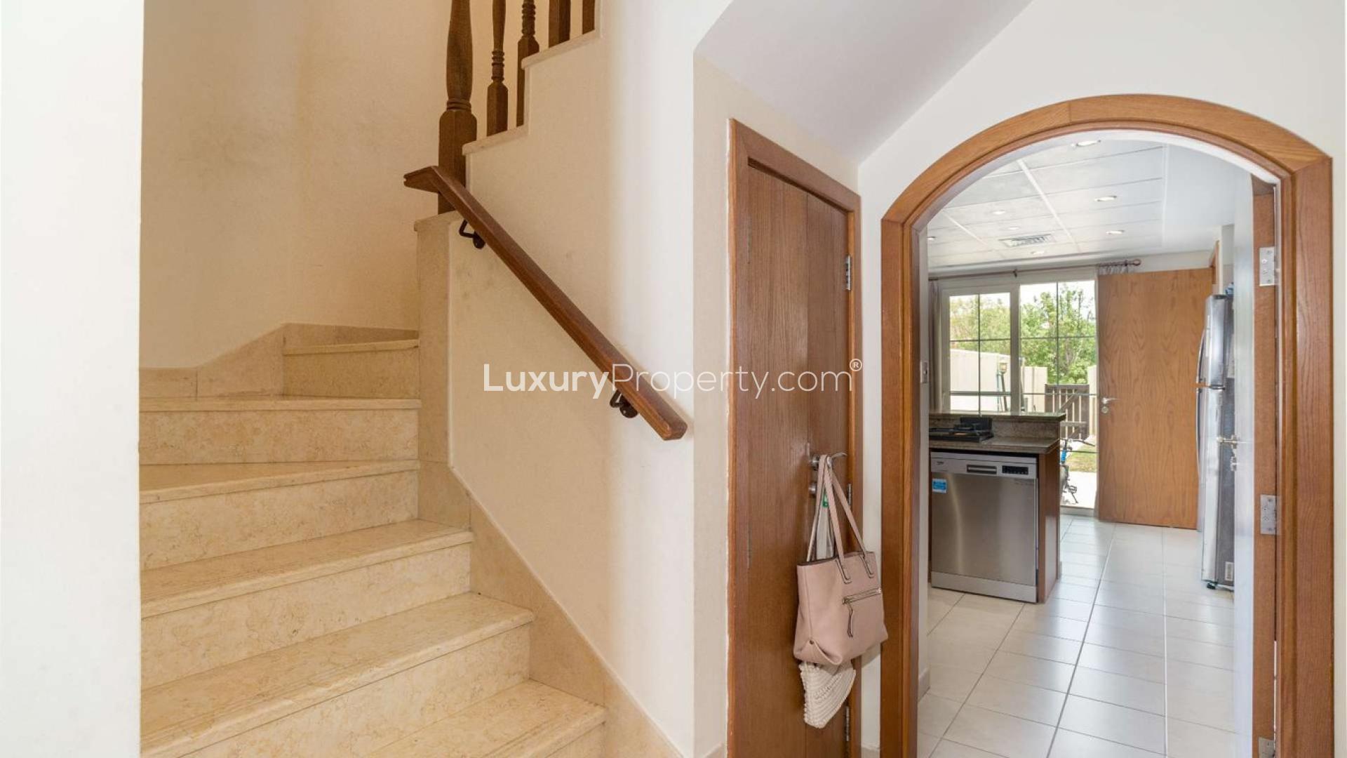 Corner Type 3E Villa living room with garden view in Al Reem 1, Arabian Ranches