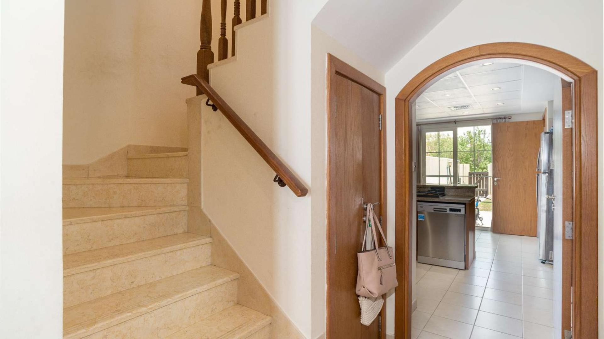 Corner Type 3E Villa living room with garden view in Al Reem 1, Arabian Ranches