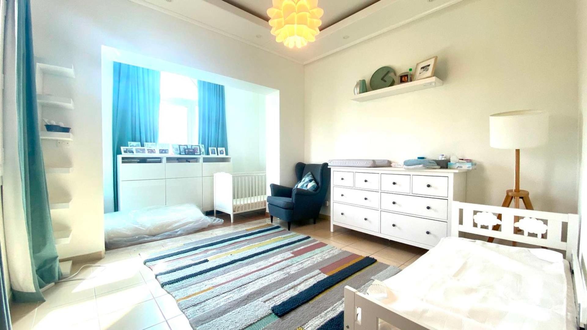 Living room in spacious 4-bedroom villa, Palmera 2, Arabian Ranches, featuring modern decor