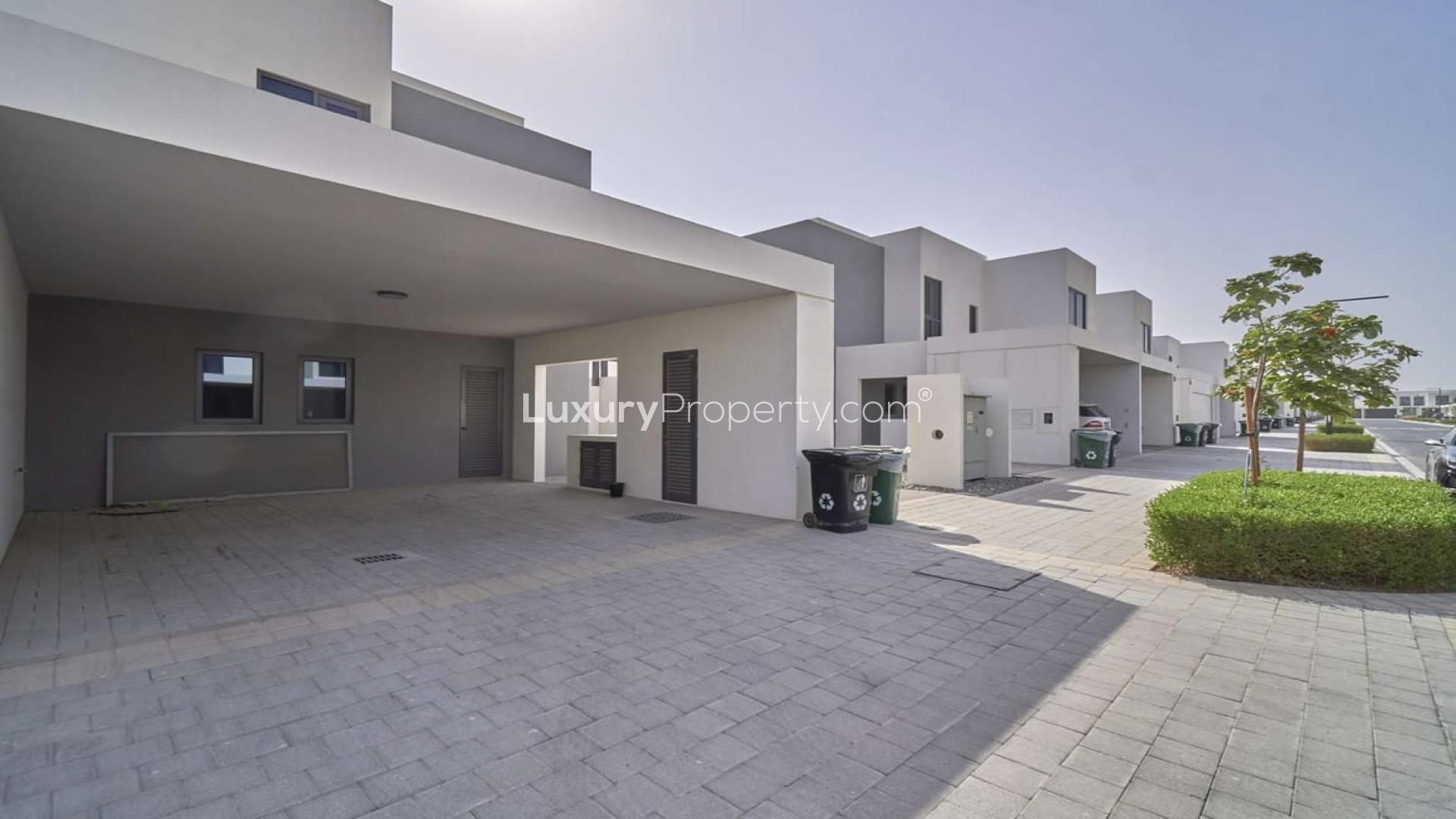 Bright living room with large windows in Dubai Hills Estate villa for rent