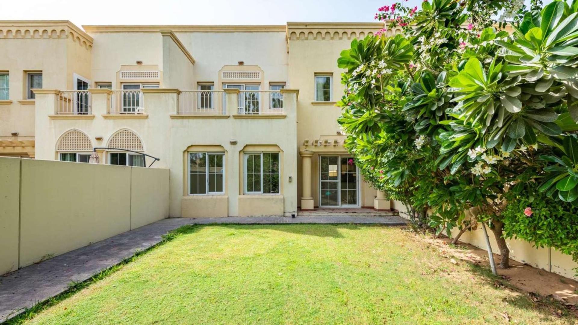 Elegant dining area with garden view in Springs 5 three-bedroom villa for rent