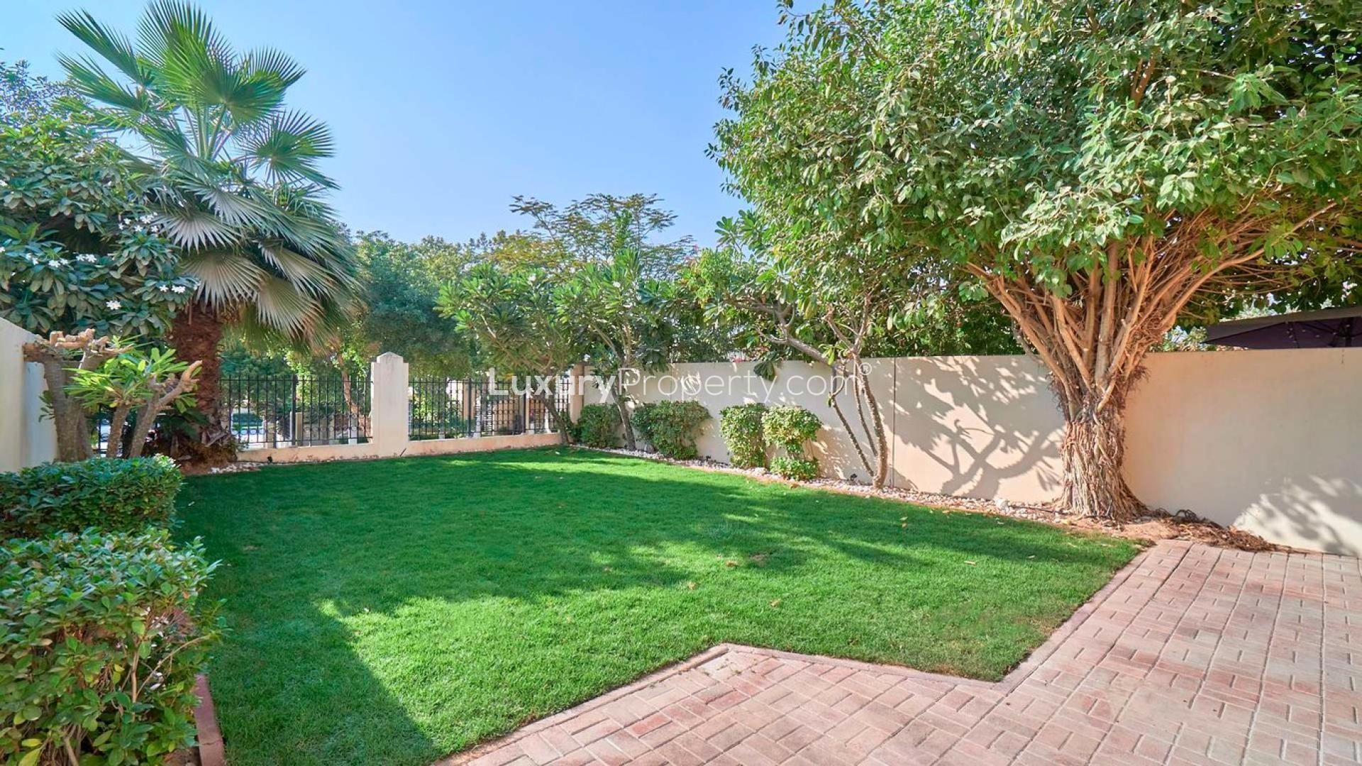 Lush garden view from single row 3-bedroom villa in Ghadeer, The Lakes