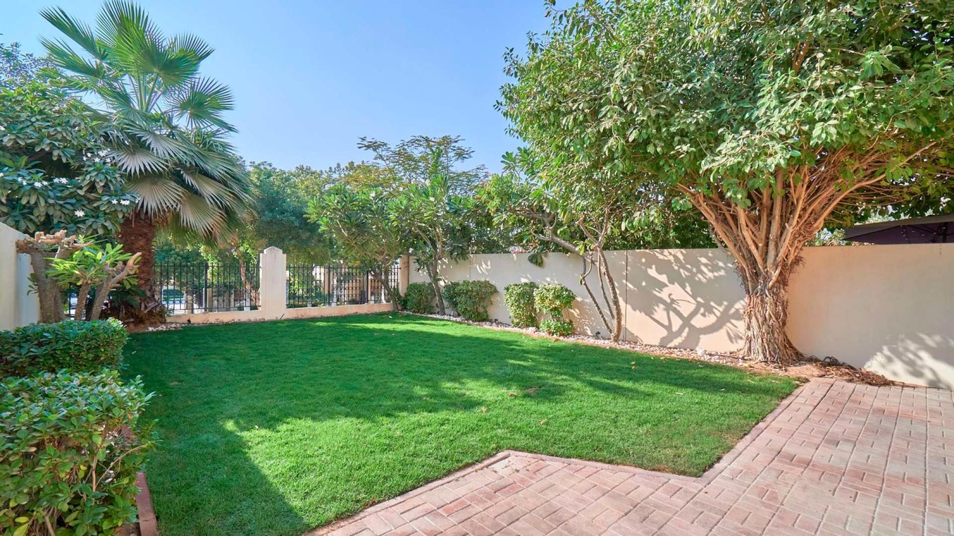 Lush garden view from single row 3-bedroom villa in Ghadeer, The Lakes