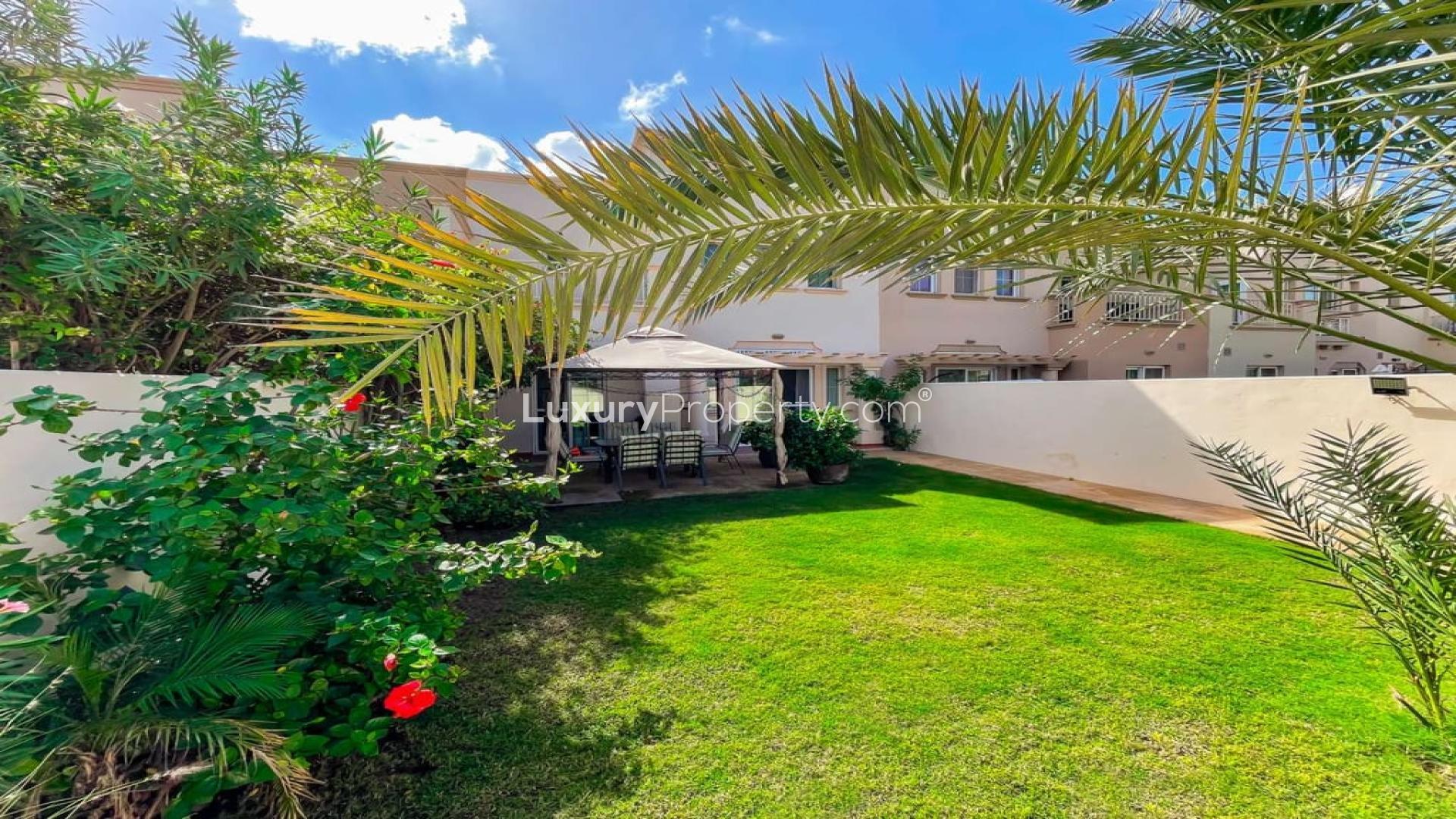 Bright living and dining area in 3-bedroom Springs 11 villa with modern decor