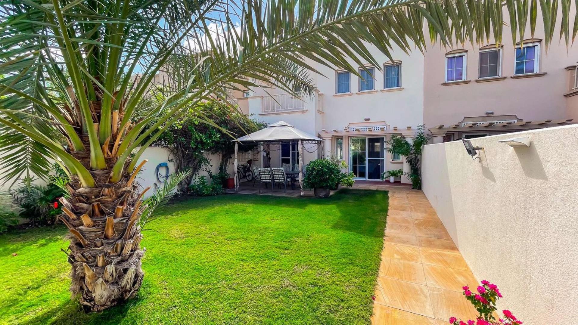 3-bedroom villa garden view with lush greenery and park in Springs 11 community