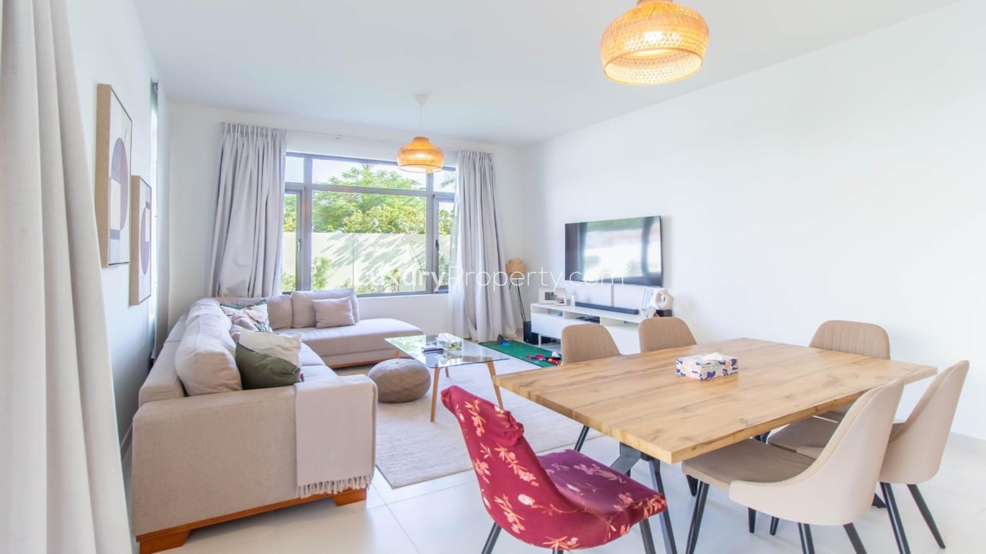 Modern villa exterior with spacious driveway in Mira Oasis, Reem community, available for rent