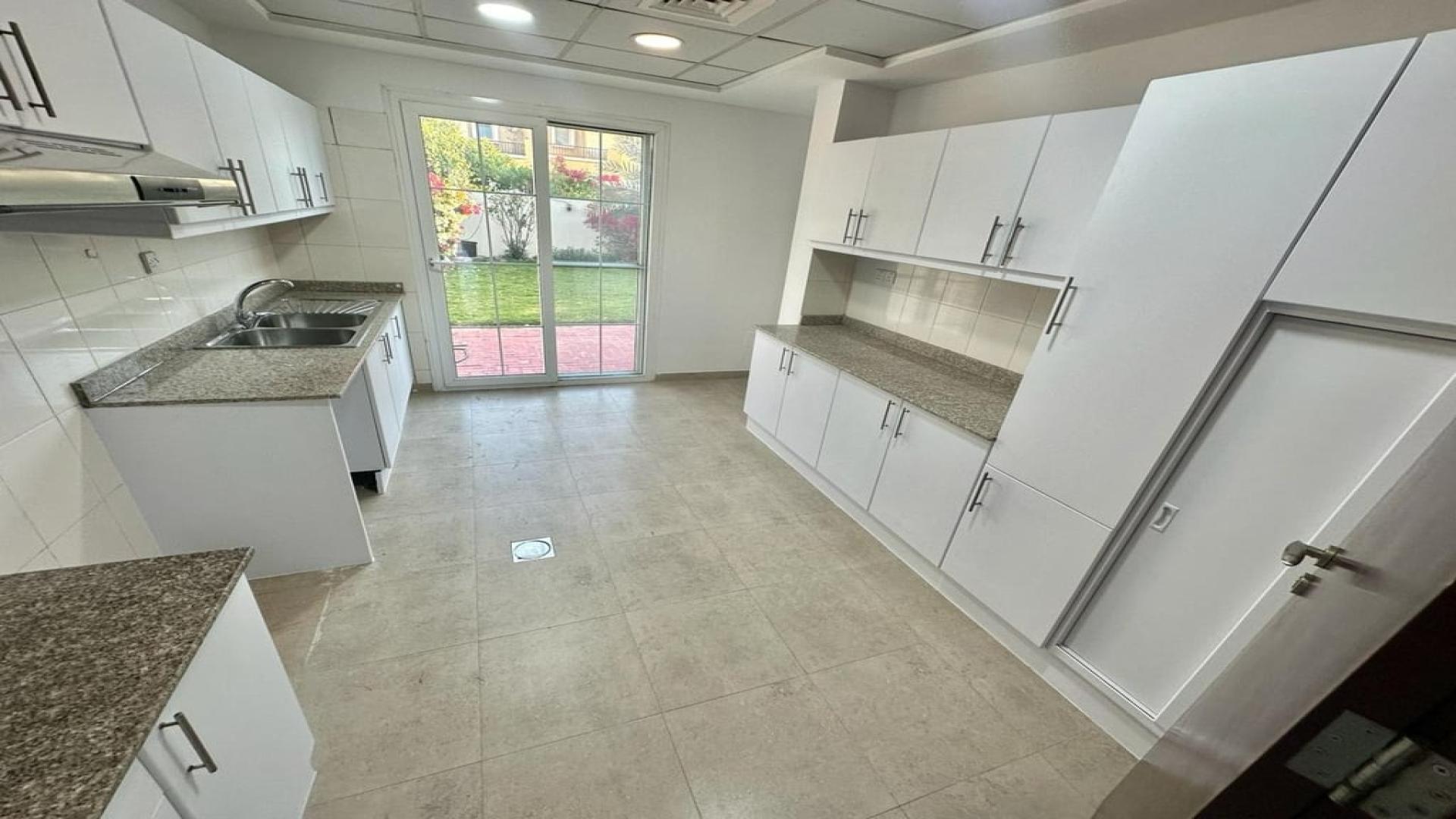 Upgraded kitchen with granite countertops in Al Reem villa, Arabian Ranches, available for rent