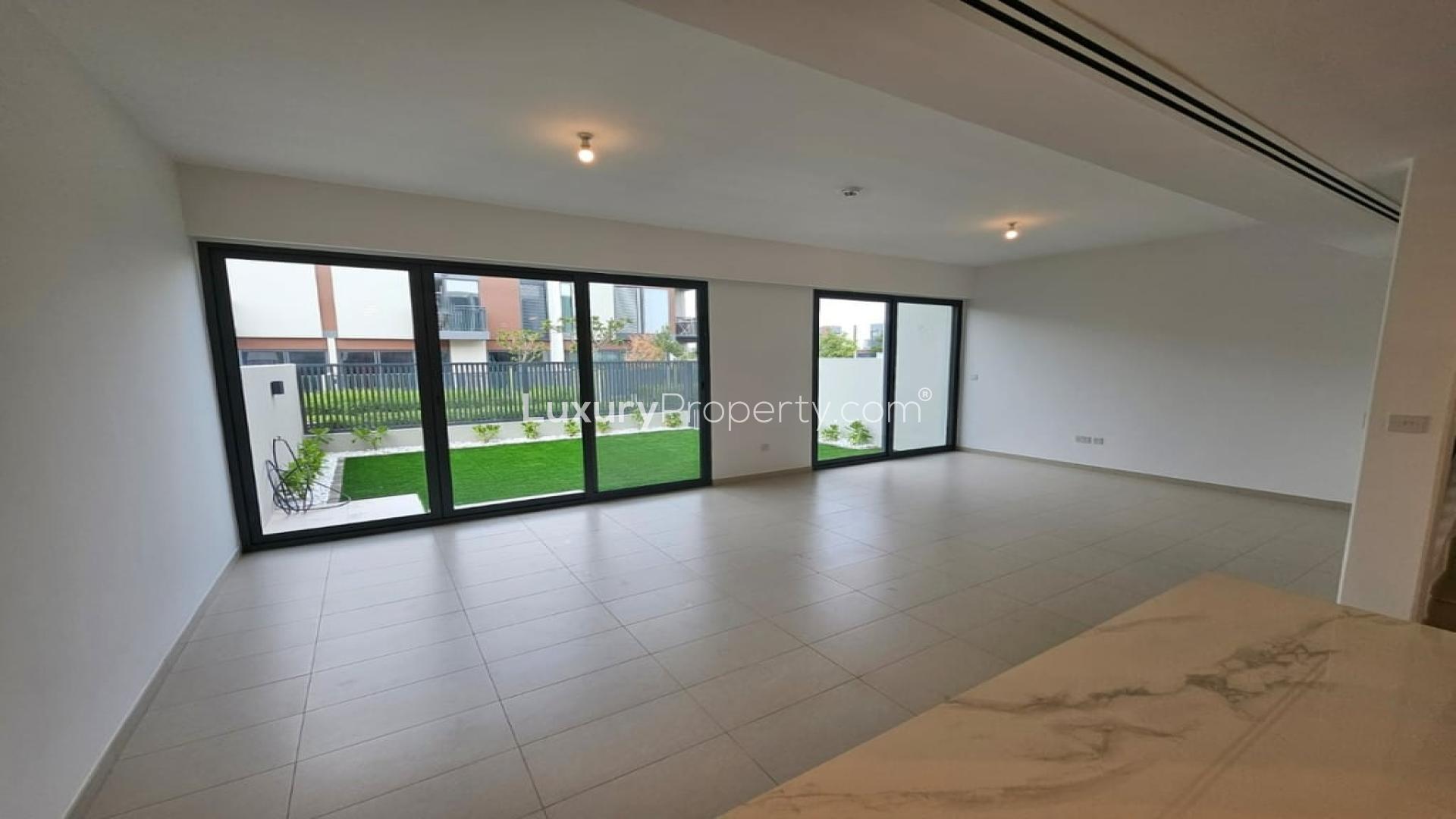 Brand new Cherrywoods villa community with landscaped pool area in Dubai Land for rent