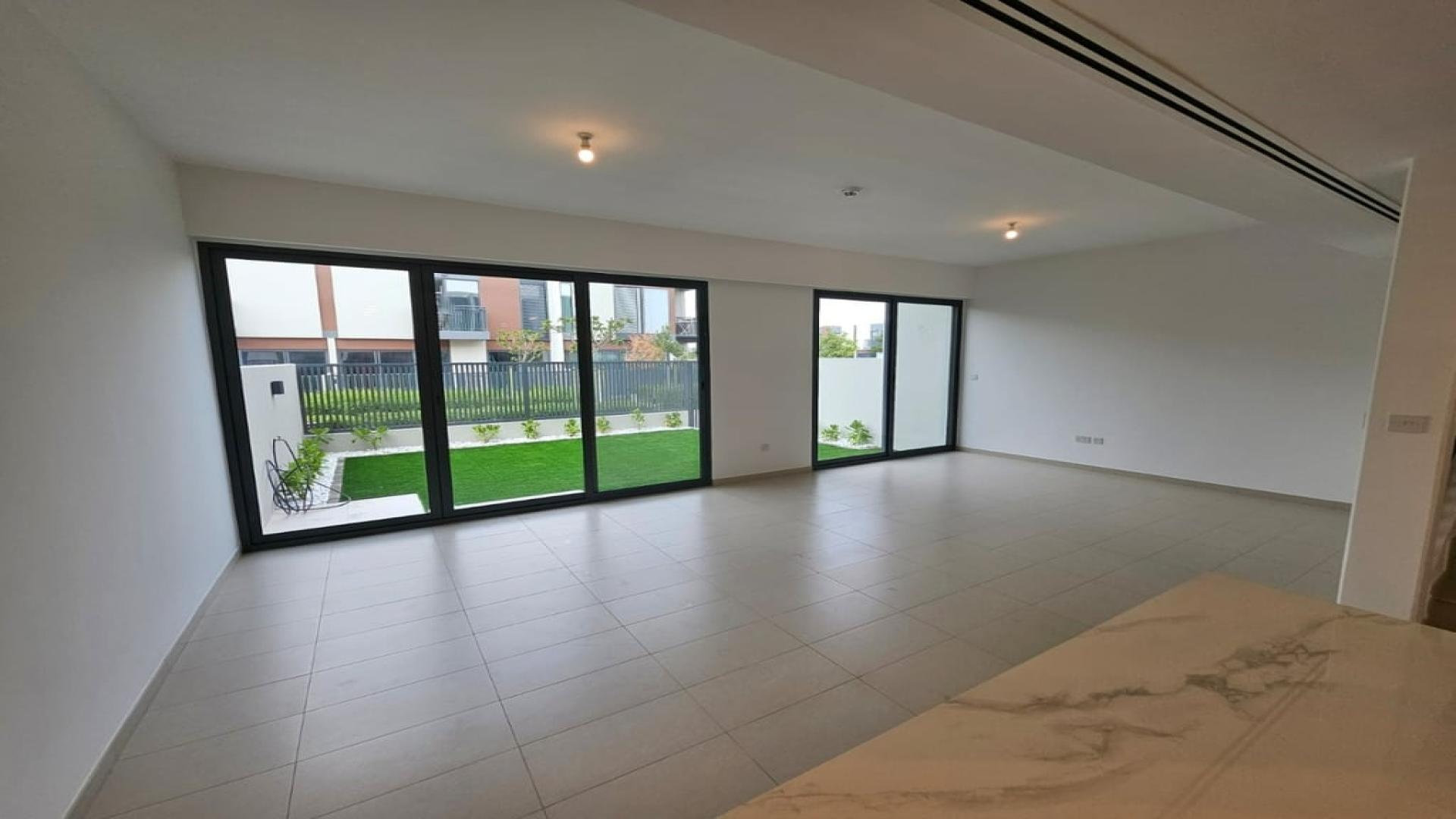 Brand new Cherrywoods villa community with landscaped pool area in Dubai Land for rent