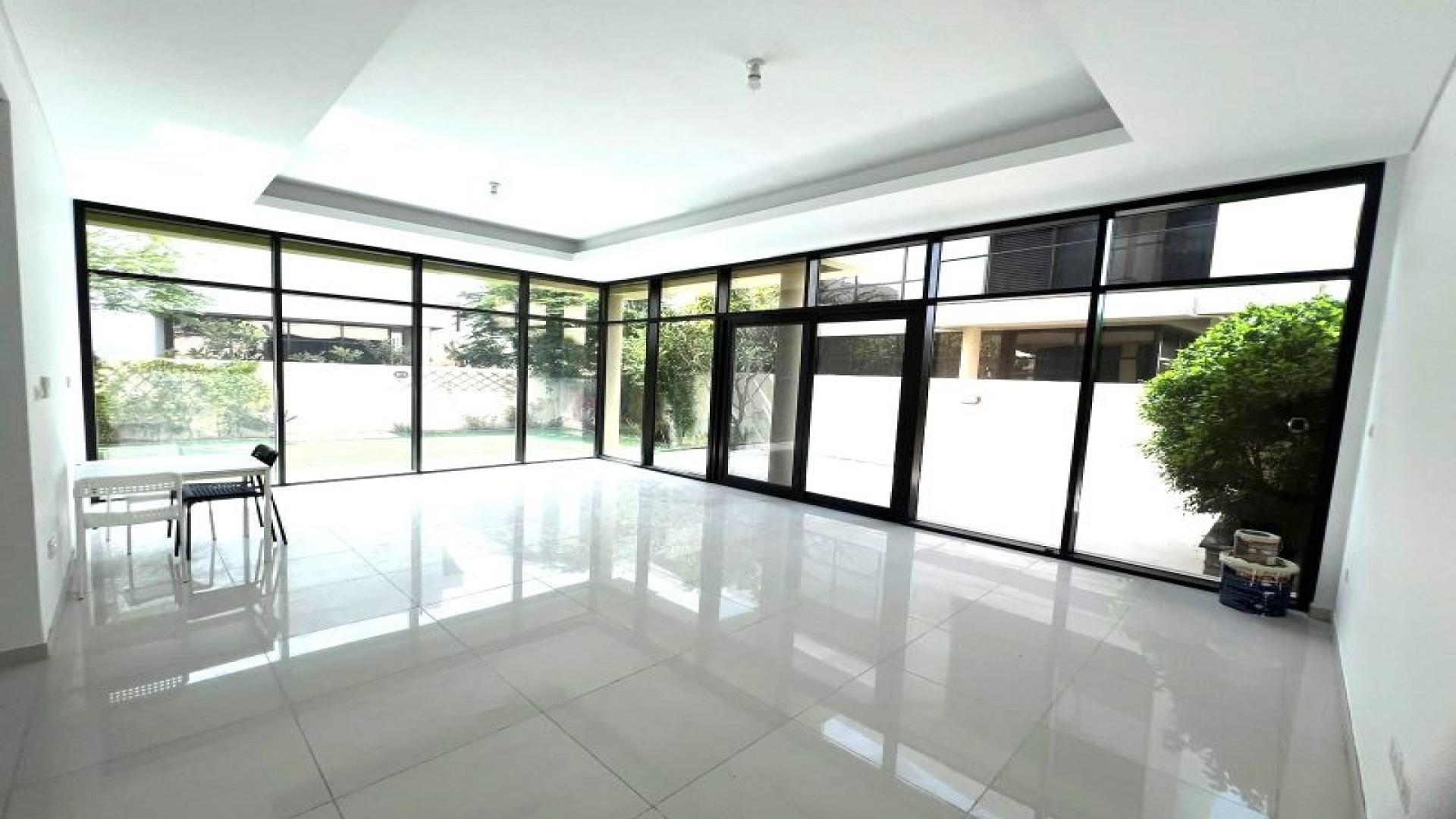 Spacious patio of a Richmond villa in Damac Hills, available for rent