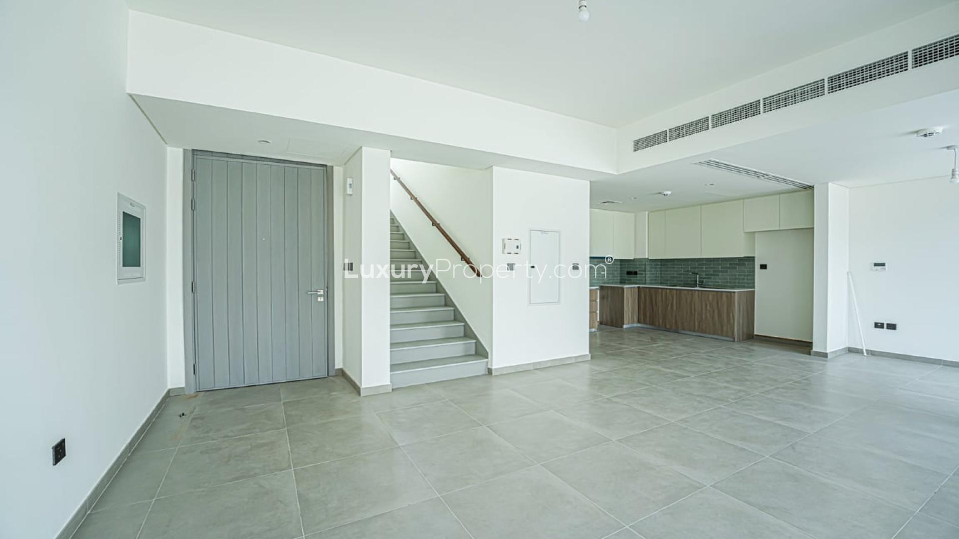 Contemporary villa interior with large windows in The Valley, Eden community, available for rent