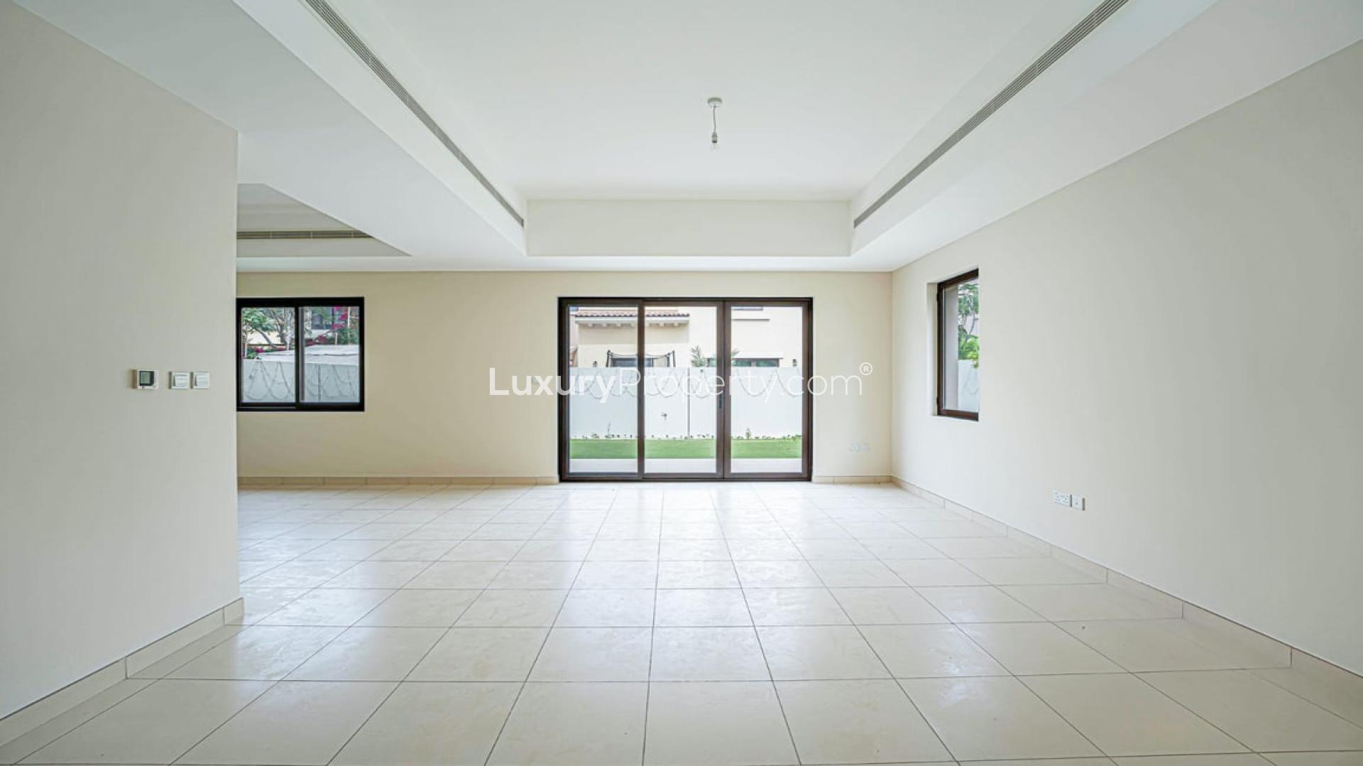 "Spacious backyard of 3-bedroom villa for rent in Mira 3, Reem community.",Spacious living area in 3-bedroom villa for rent, Mira 3, Reem community
