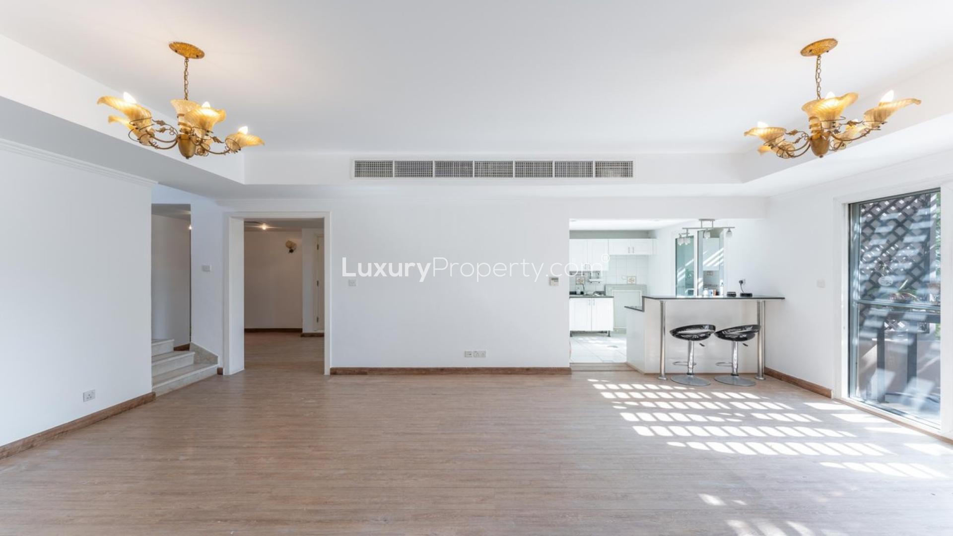 N/A,Bright living area in upgraded 3-bedroom villa, The Springs 14, with modern kitchen