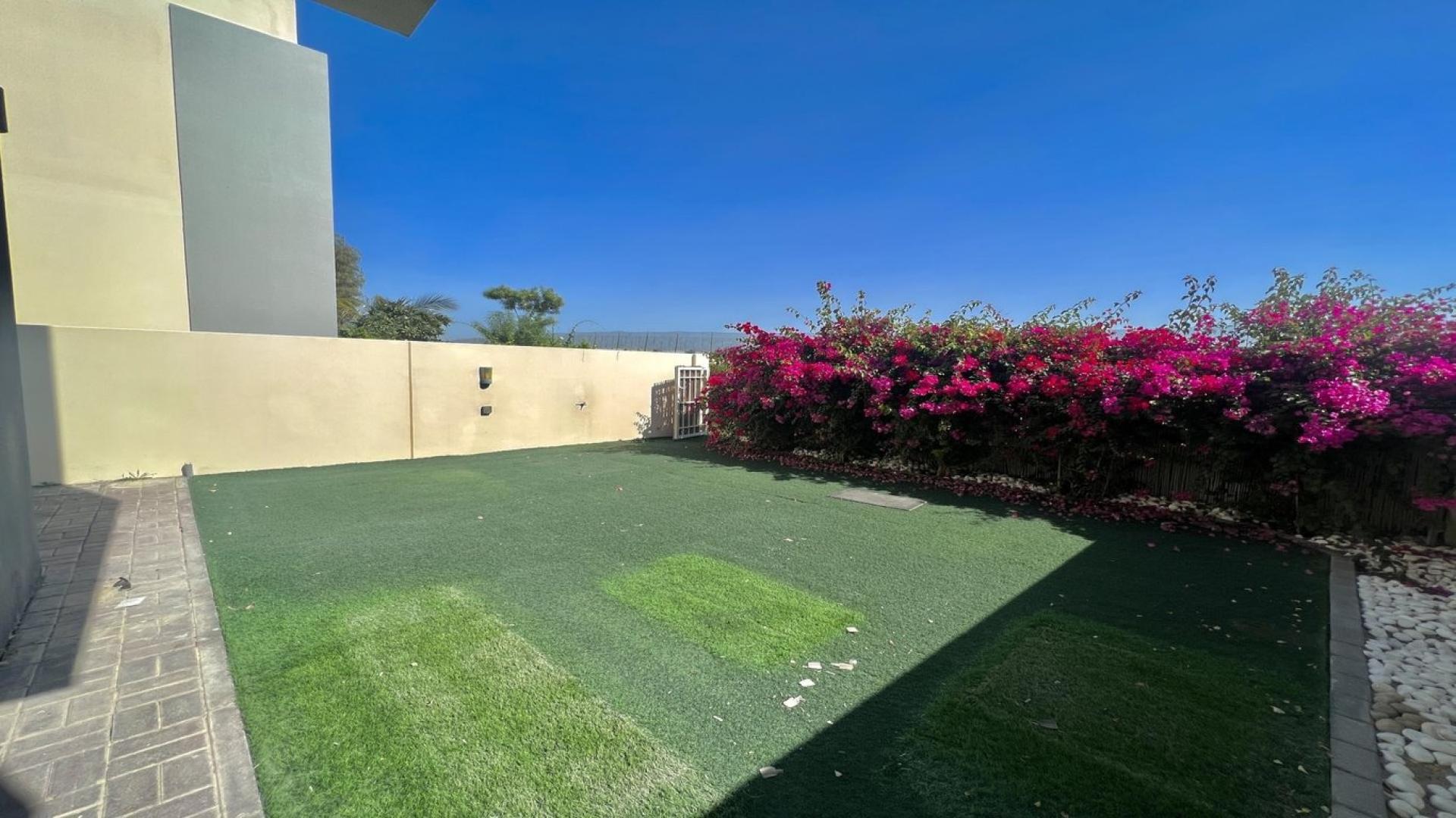 Bright living room in luxury 3-bedroom villa, Maple at Dubai Hills Estate