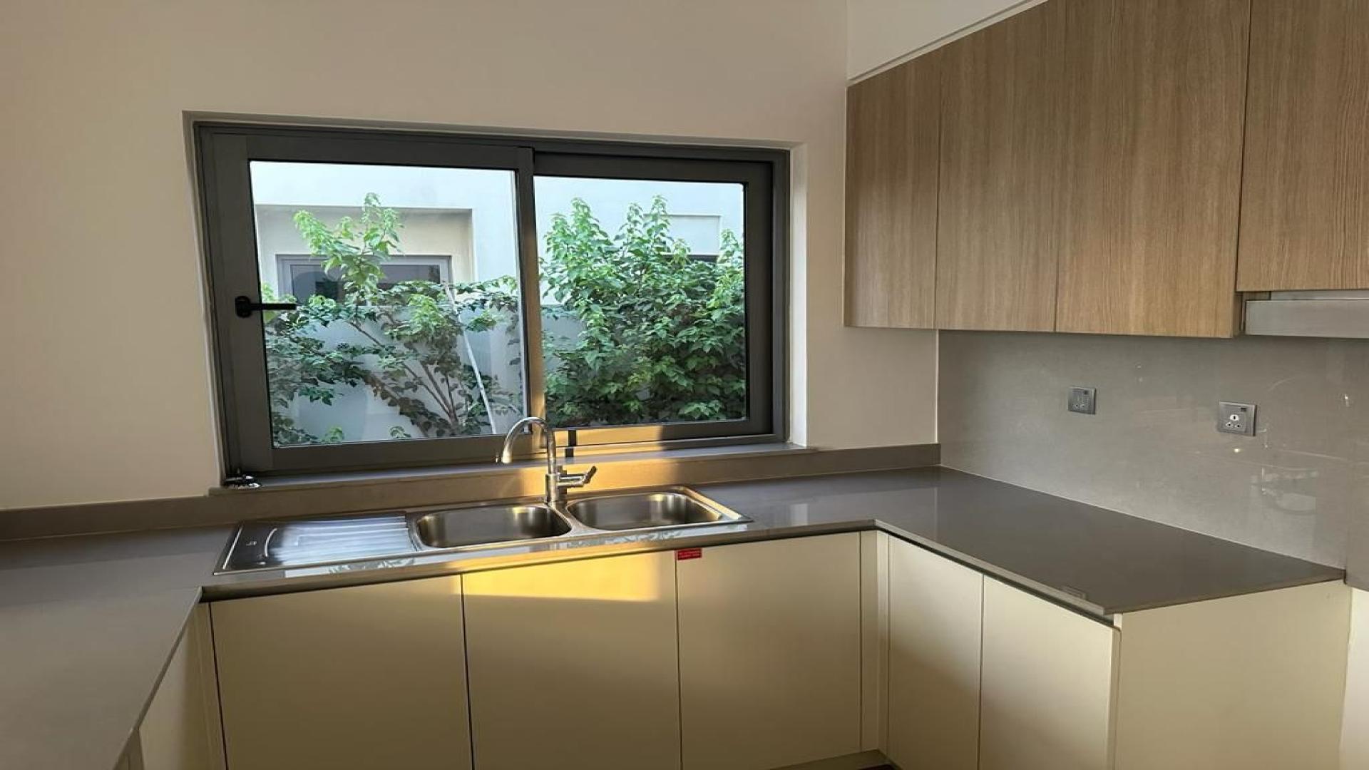 N/A,Spacious living room with large windows in Sidra Villas, Dubai Hills Estate