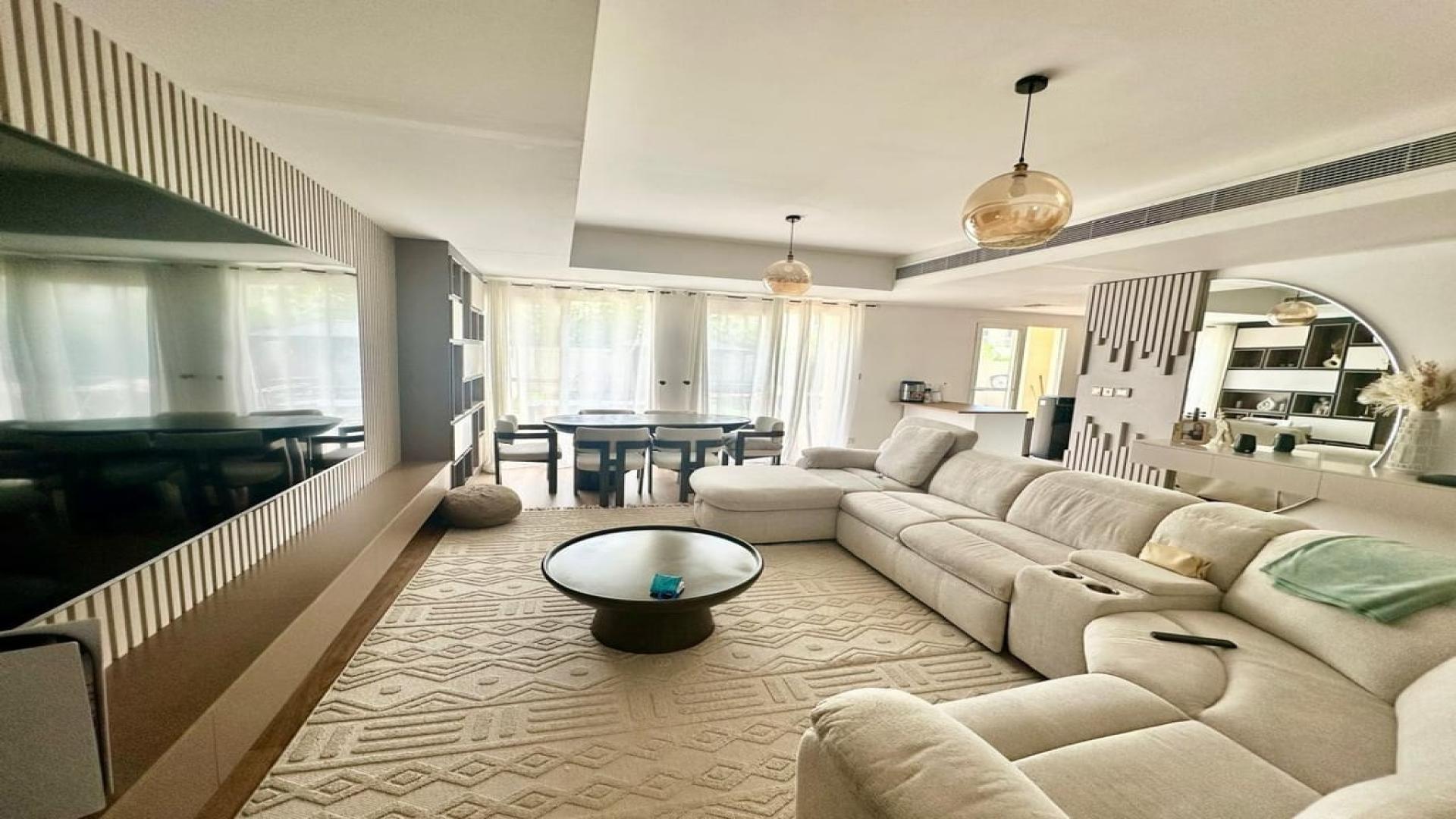 Charming 3-bedroom villa exterior with garden for rent in Springs 4, Dubai