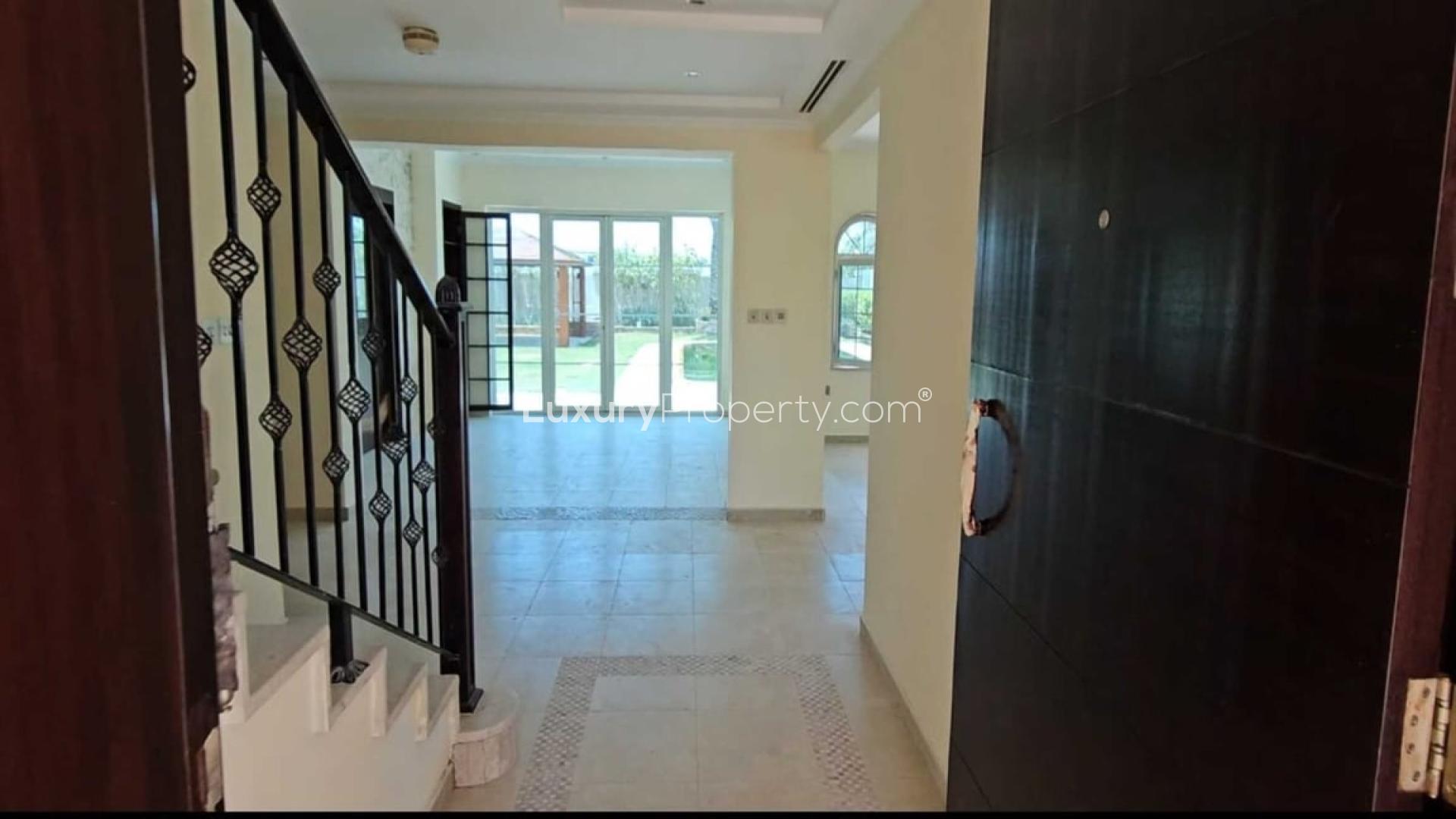 Exterior view of Legacy Villa with pool in Jumeirah Park, Dubai, for rent