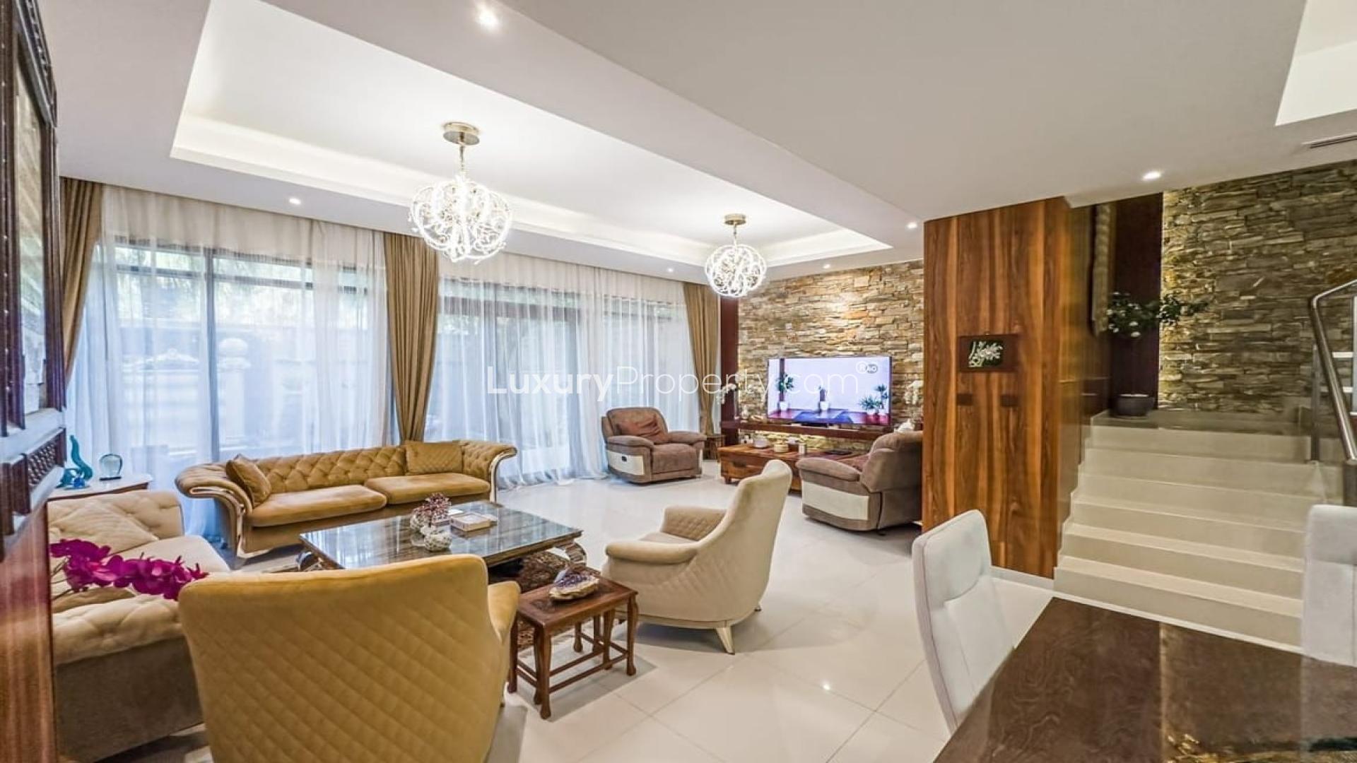 Luxurious living room in upgraded Damac Hills villa with elegant decor and natural light