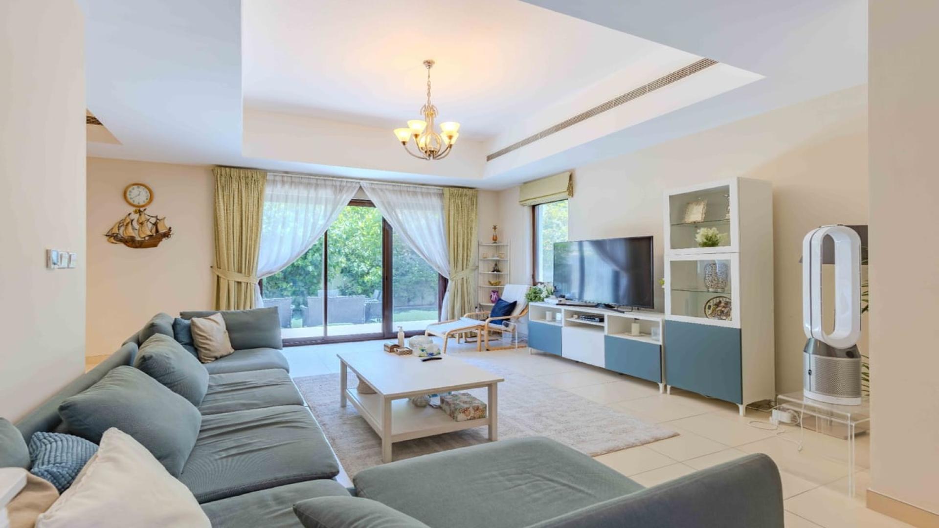 Spacious living room in Mira villa, Reem community, featuring modern furniture and open layout