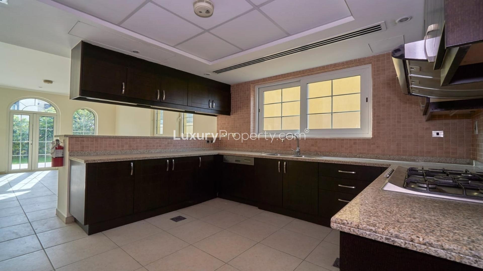 Bright open-plan kitchen and living area in Jumeirah Park Legacy villa for rent
