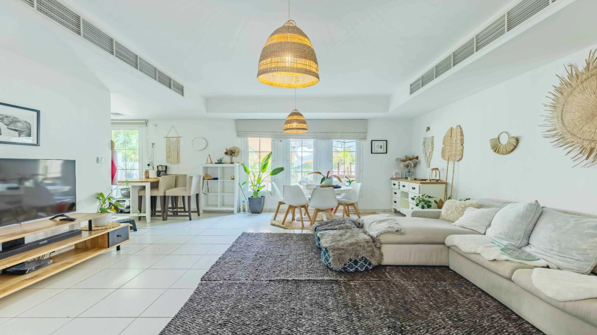 Exterior view of charming 3-bedroom villa with garden in Springs 11, for rent