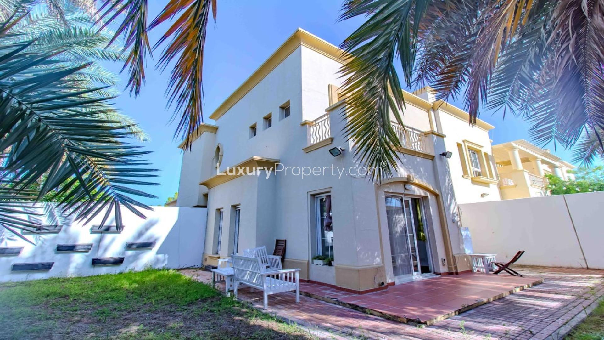 Elegant 3-bedroom villa exterior with patio in Springs 3