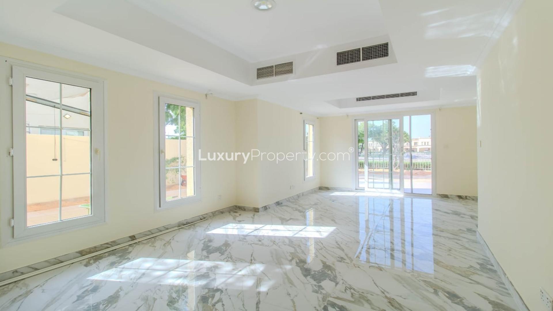 "Spacious living room with marble flooring in 3-bedroom villa, The Springs, lake view.",Bright living room with marble floors in 3-bedroom villa, Springs 4, lake view rental