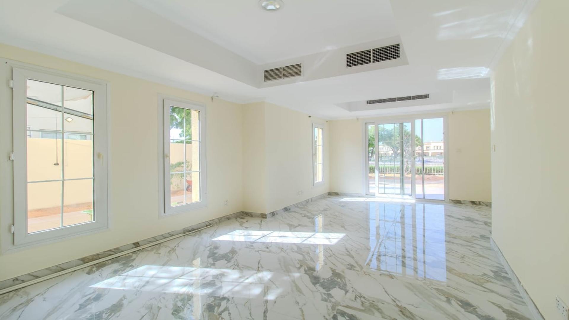 "Spacious living room with marble flooring in 3-bedroom villa, The Springs, lake view.",Bright living room with marble floors in 3-bedroom villa, Springs 4, lake view rental