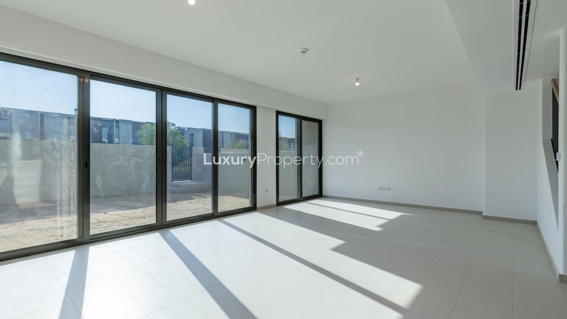 N/A,Bright, spacious living room in 3-bedroom villa, Cherrywoods, Dubailand, for rent