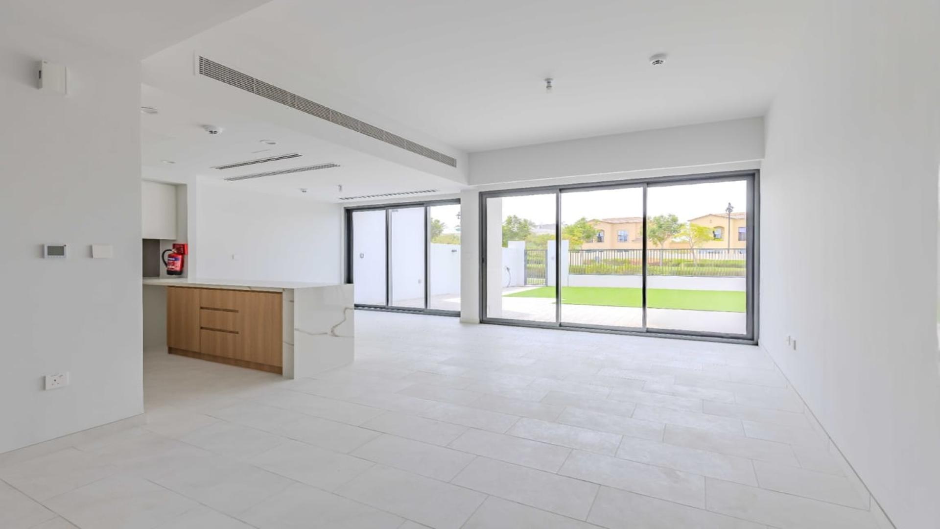 Spacious open-plan kitchen and living area in 3-bedroom villa, La Rosa, Dubai Land