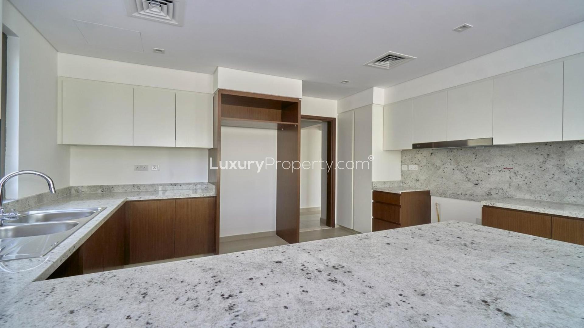 Luxurious villa interior in Azalea, Arabian Ranches 2, featuring open living space and staircase