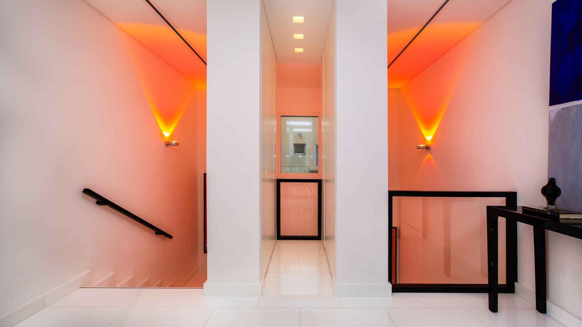 Luxurious living room in upgraded 3-bedroom villa, Meadows 9, Dubai with pool view