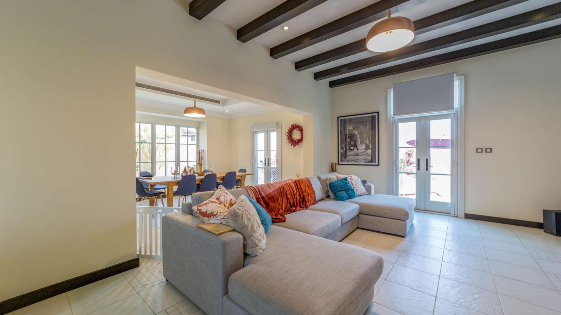 Luxurious living room in Firestone Villa, Whispering Pines, Jumeirah Golf Estates, with elegant decor