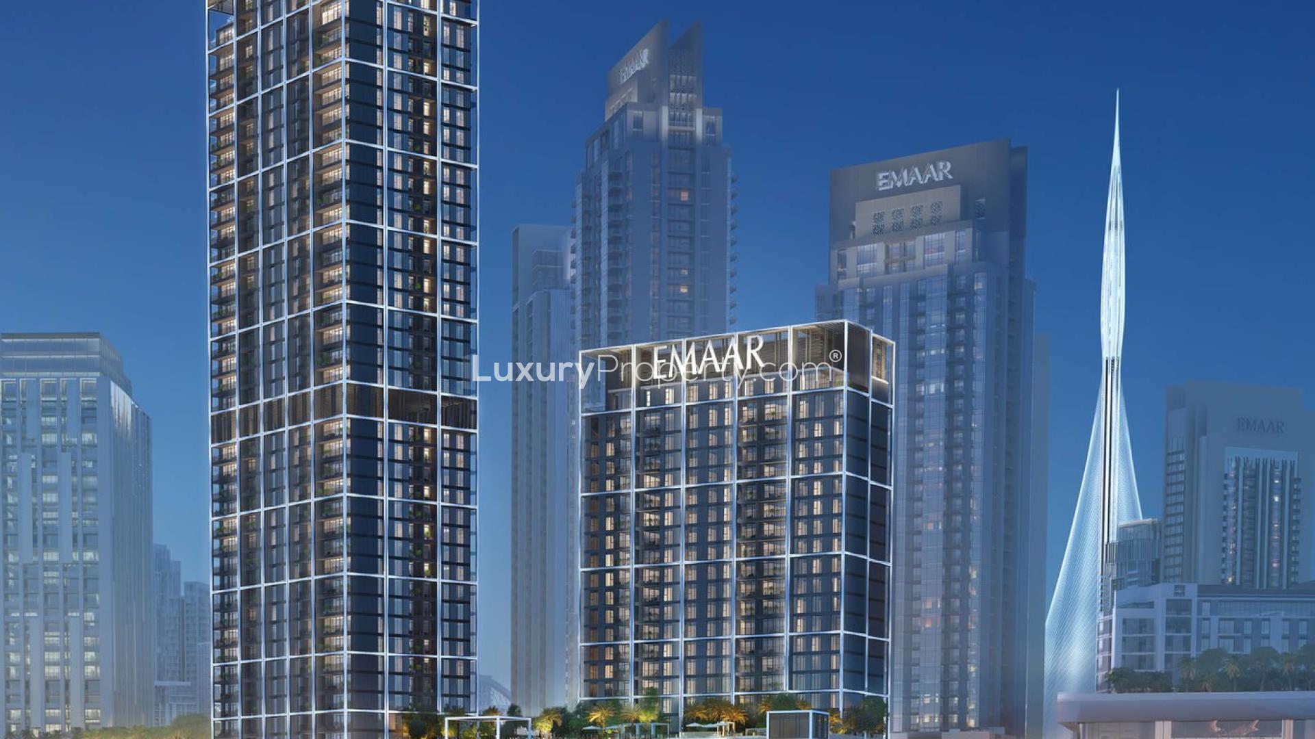 "Modern waterfront villa exterior in Dubai Creek Harbour's Creek Edge community, showcasing luxury living.",Waterfront villa exterior at Creek Edge, Dubai Creek Harbour, with Burj Khalifa view