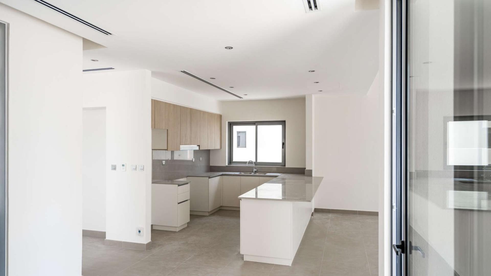 Modern kitchen in large corner villa at Sidra Villas, Dubai Hills Estate, for sale
