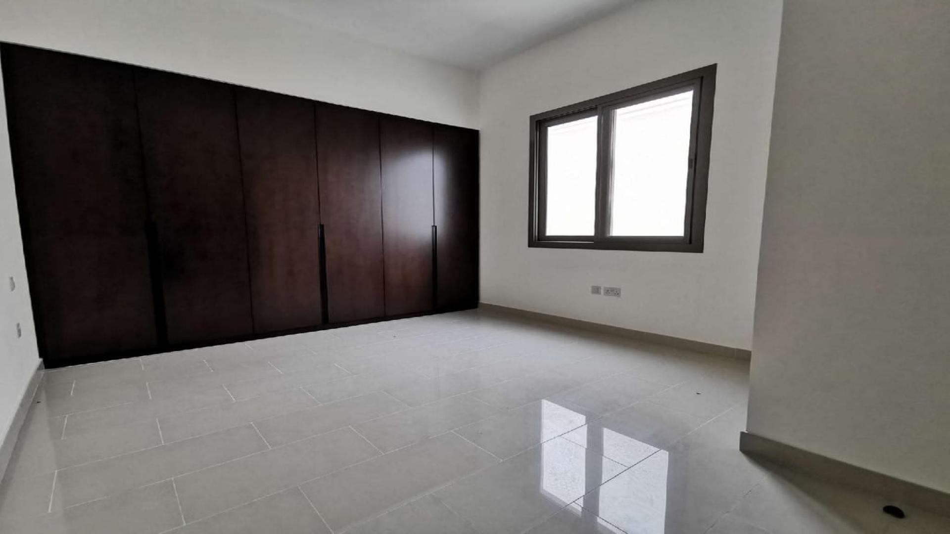 Spacious living area in Azalea, Arabian Ranches 2 villa with large windows and natural light