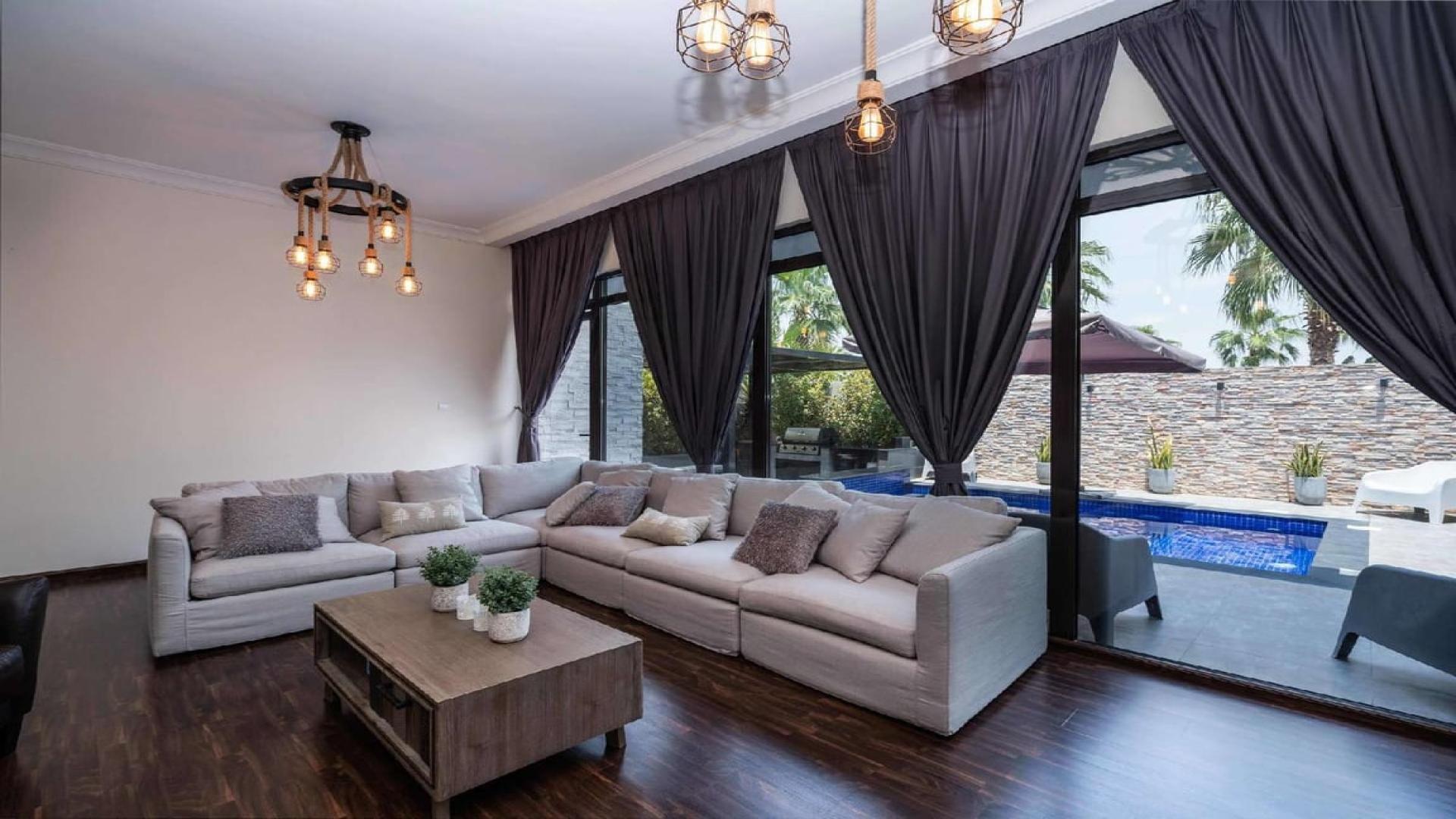 Front view of modern 3-bedroom villa for sale in Damac Hills, Whitefield community