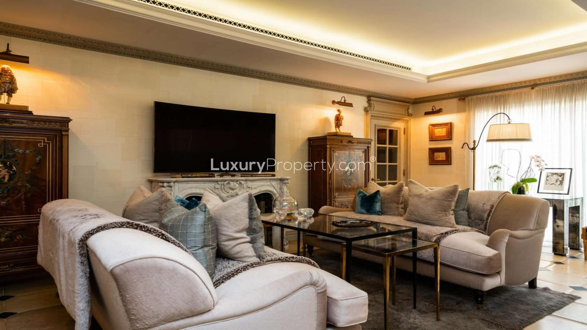 Elegant living room in Parisian chateau-style villa, Green Community Motor City