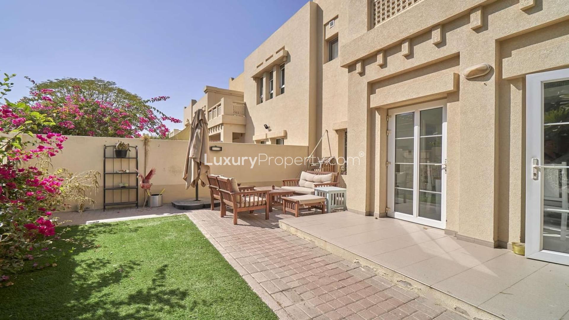 Living room and dining area in three-bedroom villa, Zulal, The Lakes